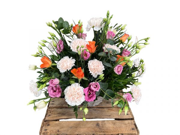 Centro funerario de flores variadas tamaño pequeño