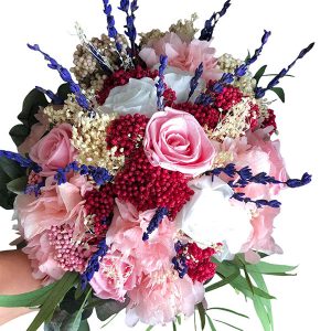 Ramo de novia preservado redondo en tonos rosas, fucsias, malvas y crudos